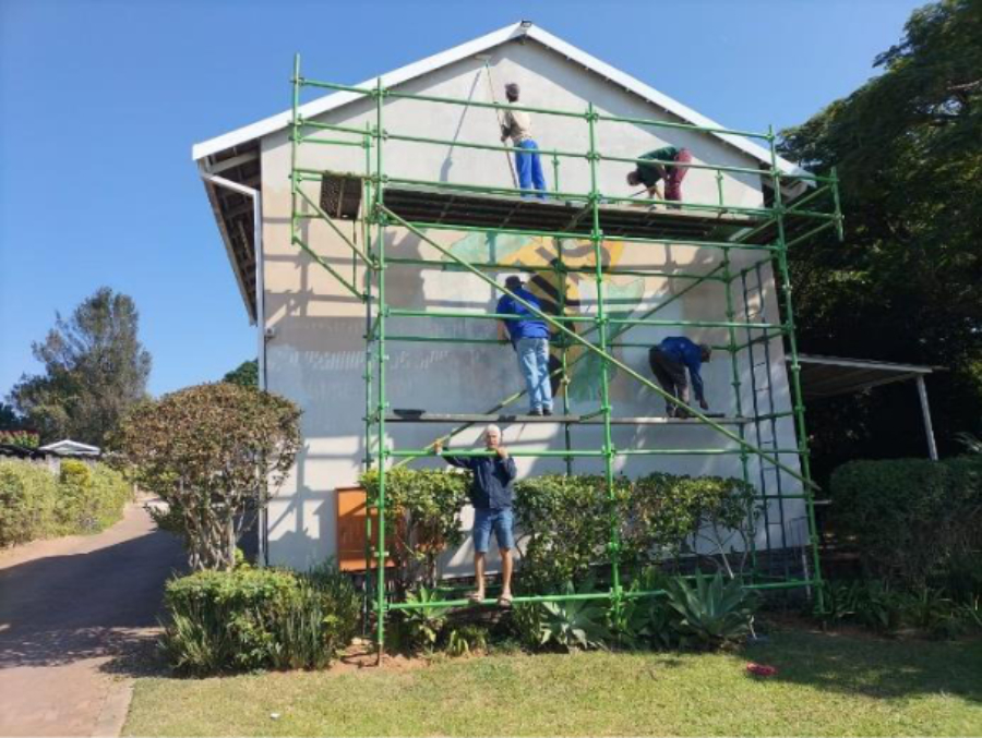 Preparing to paint a wall