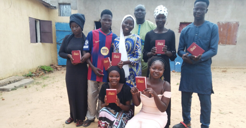 Giving Bibles at La Bergerie church